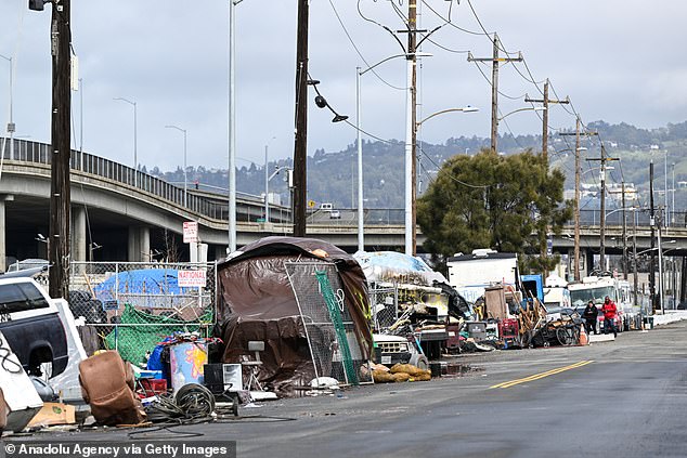 A view of a homeless encampment on a street in West Oakland, California, last month as local officials took steps to clear the buildings