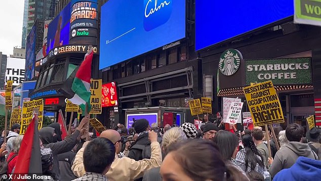 Skirmishes erupt in New York's Times Square as pro-Palestinian groups rally - after Hamas attacks Israel, leaving more than 900 dead