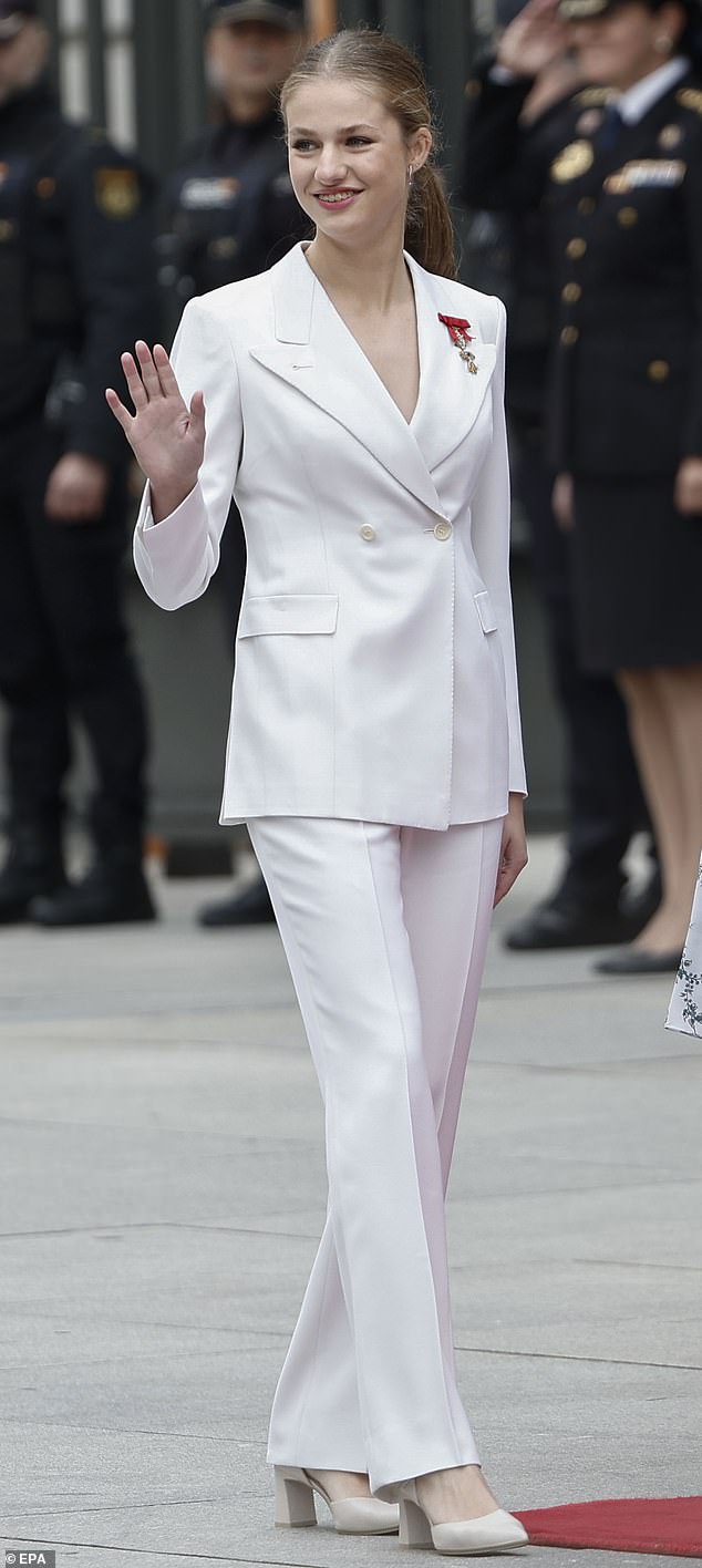 Princess Leonor, 18, arrives at the House of Representatives in Madrid this morning ahead of her swearing-in