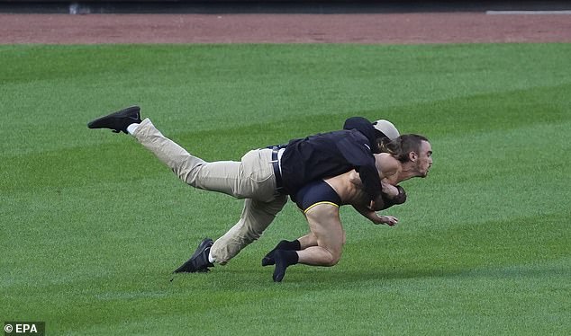 A streaker was knocked to the ground during an MLB playoff game at Camden Yards