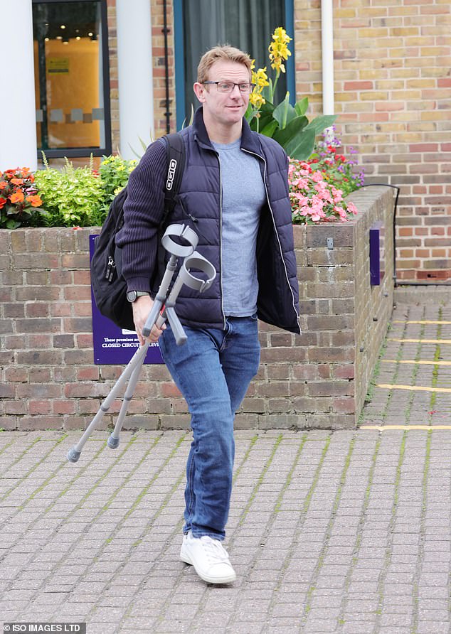 Ouch: Jody Cundy stepped out on crutches on Friday for fear he won't be able to perform during Strictly Come Dancing on Saturday