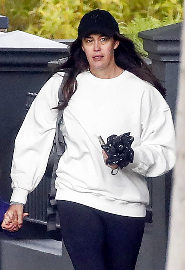 Supermodel Megan Gale went makeup-free in a sporty ensemble as she enjoyed a solo stroll in Melbourne on Thursday