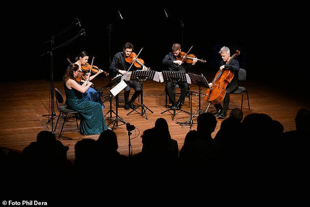 Researchers recruited 132 concertgoers in Berlin, aged 18 to 85, who listened to a string quintet (pictured) playing music by Beethoven, Brahms and the London Philharmonic Orchestra's current composer-in-residence, Brett Dean.