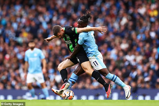 Jeremy Doku came out on top with James Milner in Man City's victory over Brighton at the Etihad