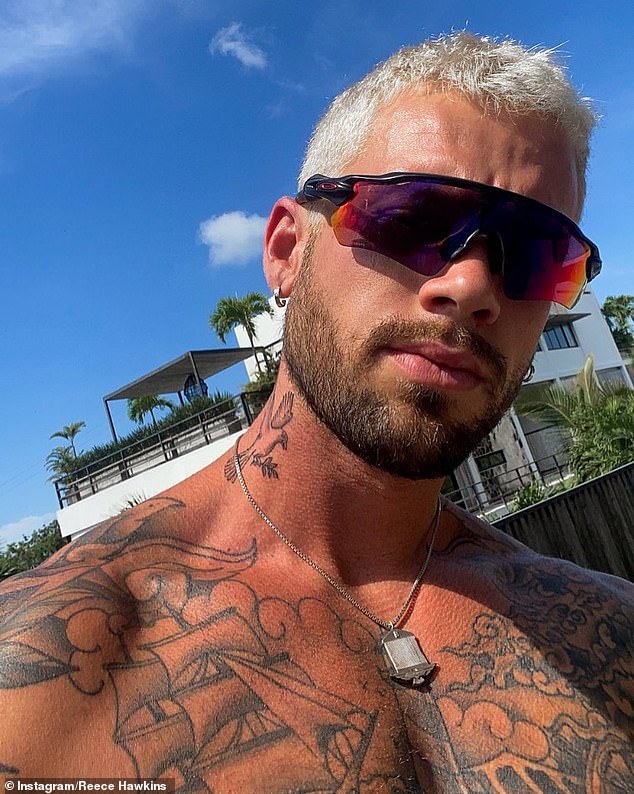 Tammy Hembrow's ex-fiancée Reece Hawkins (pictured) shocked fans on Tuesday by debuting his new neck tattoo - which covers up his son Stone's name tattoo