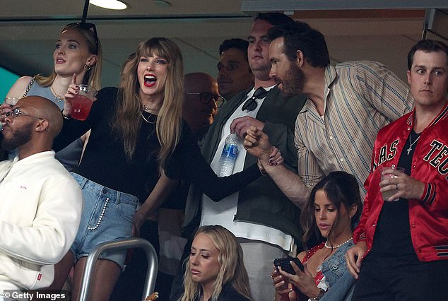 Excited: Taylor was joined by her friends Ryan Reynolds (right) and Sophie Turner (far left) and Brittany Mahomes (below)