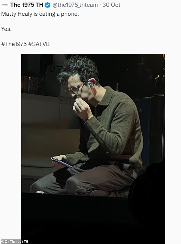 Unique flavour: Matty Healy stunned fans when The 1975 claimed the star was eating a phone on stage during their Chicago performance on Monday