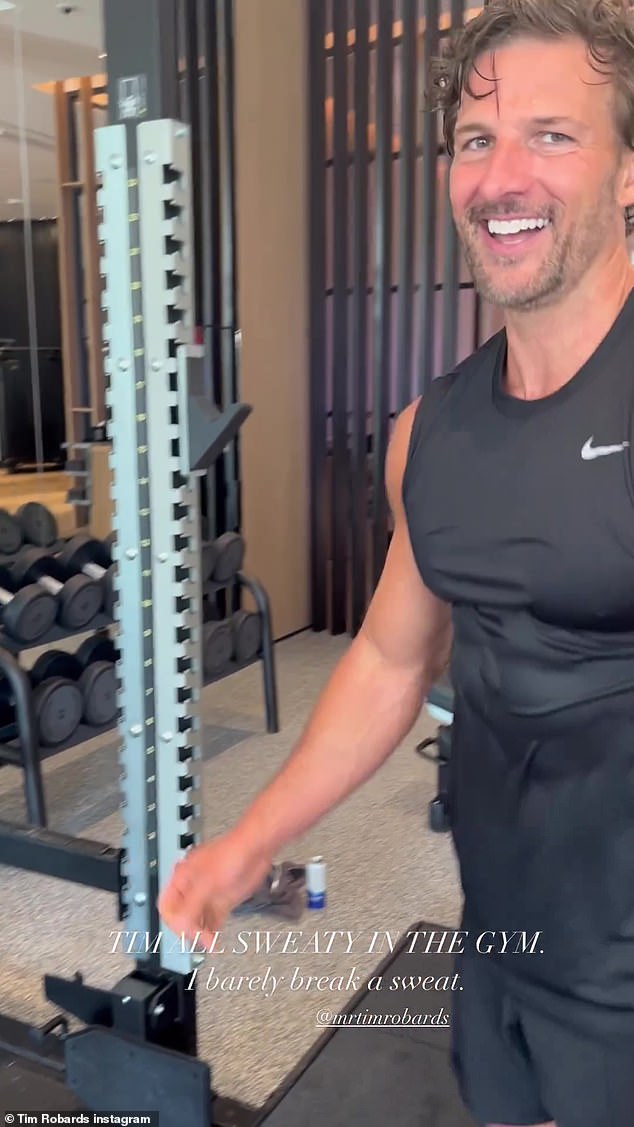 Bachelor Tim Robards worked up a sweat and showed off his massive biceps as he completed an intense workout on Saturday