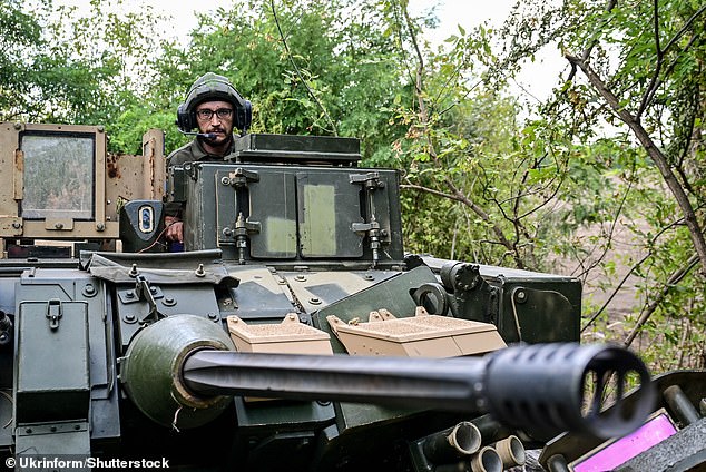 It remains to be seen whether the US will send a new round of military aid to Ukraine.  Pictured Gunner 'Molfar', 39, a Bradley Infantry Fighting Vehicle crew member of the 47th Magura Mechanized Brigade