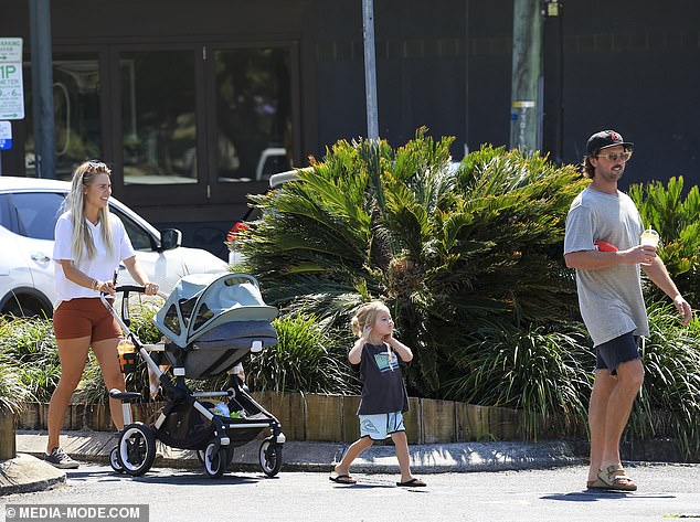 The couple couldn't wipe the smiles off their faces as they took a relaxing stroll around the city