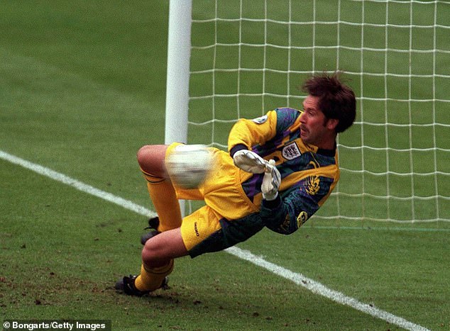 One of the goalkeepers famous for their quick reaction times is David Seaman, the former Arsenal and England player, pictured during Euro 1996 in London.