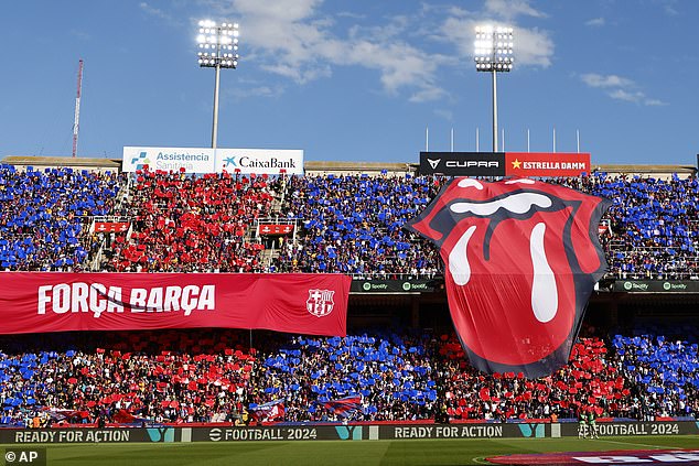 Gripping match: There was a huge turnout of fans to see Barcelona play Real Madrid