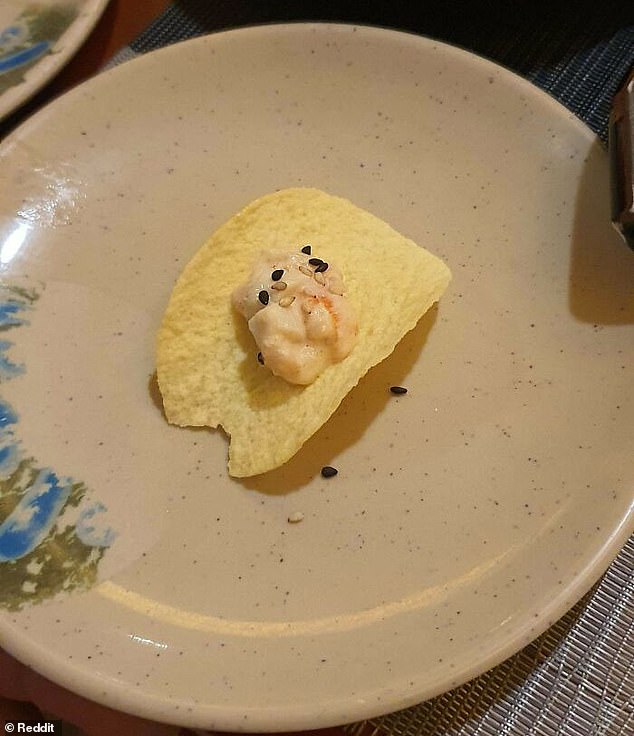 Some surimi served on a broken pringle shared by 'Ikigairamen' in the 'r/StupidFood' thread.