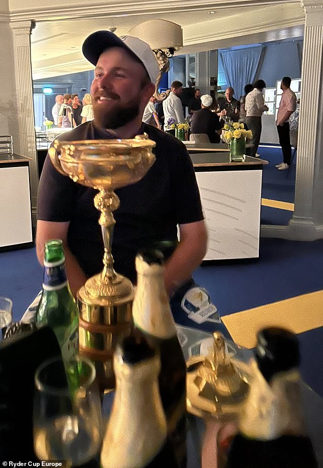 Shane Lowry looks so happy as he sits at the Ryder Cup during the post-tournament festivities in Rome