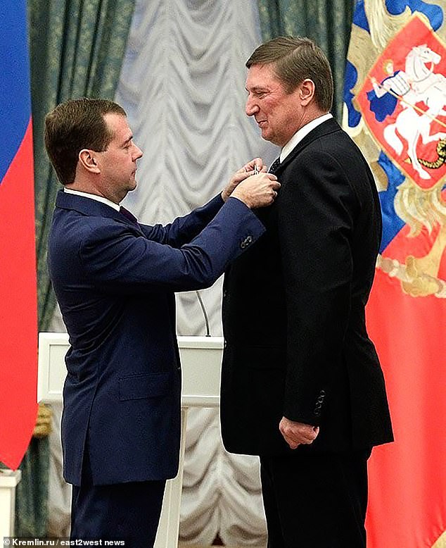 Vladimir Nekrasov, Chairman of the Board of Directors of Lukoil (R) pictured with Dmitry Medvedev (L)