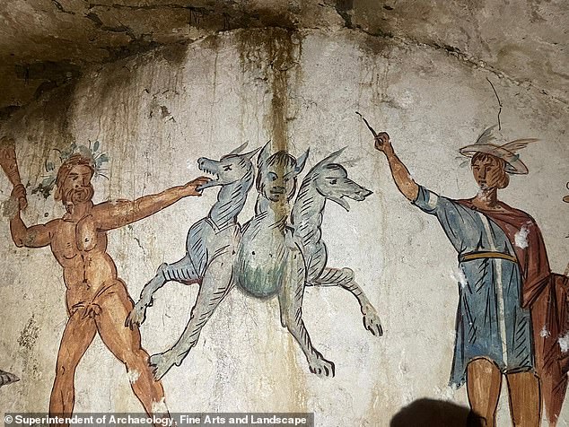 Rare find: A sealed tomb featuring a fresco of Cerberus - the three-headed dog from ancient Greek mythology - has been discovered in Italy