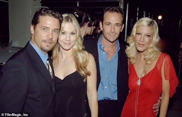 Support: She also recalled that Perry once 'talked me through the most insecure moments of a teenage life' after taking her side during an argument;  seen with Jason Priestley and Jenny Garth in 2005