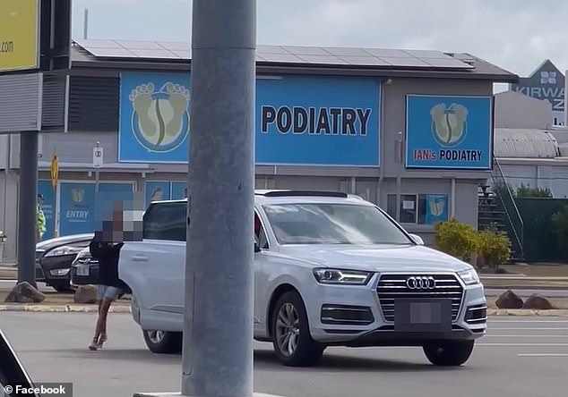 His partner was waiting for him in the busy car park, tending to their youngest when a stolen white Audi (pictured) pulled up next to her and the occupants tried to enter.