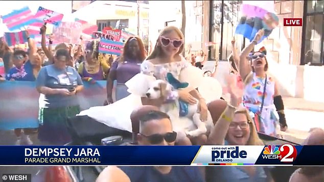 Supporters cheered Dempsey through the streets of Orlando at the city's Come Out With Pride Festival, as her beaming parents sat near the front