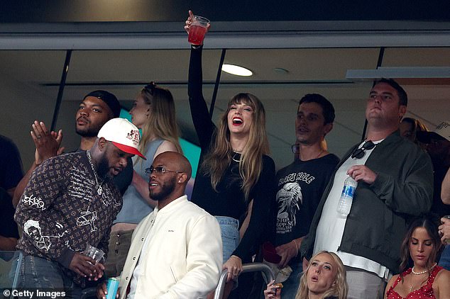 The singer was with an entourage of friends while watching the Chiefs game on Sunday