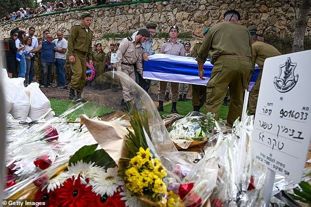 Other political leaders have not criticized Israel or its leaders as it continues to bury its dead.  Soldiers are seen here carrying the coffin of Valentin Ghnassia, 23, who was killed in a battle with Hamas militants at Kibbutz Be'eeri near the Israeli border with the Gaza Strip during his funeral on Friday.