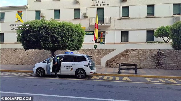 Police have arrested two men in Spain for allegedly raping a woman.  In the photo: police at the Guardia Civil headquarters in Benidorm