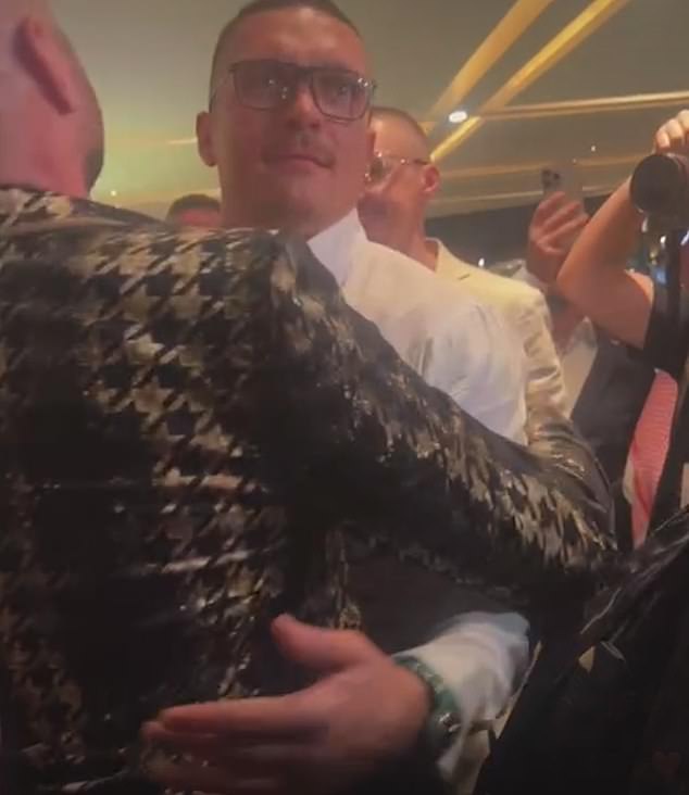 Tyson Fury and Oleksandr Usyk shared an unexpected embrace in Saudi Arabia on Friday evening