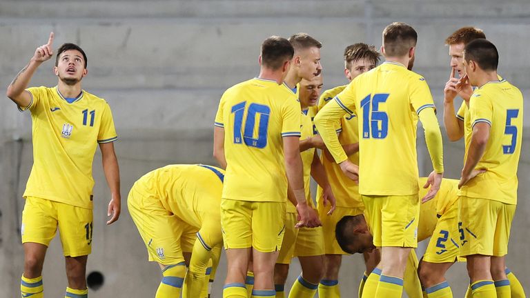 Nazar Voloshyn cheers after Ukraine's first goal against England