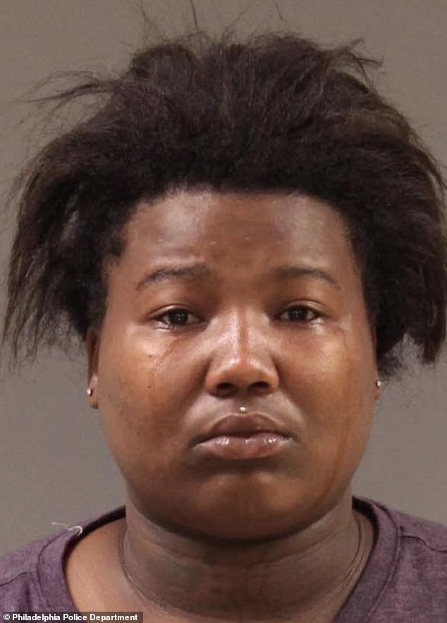 Dayjia 'Meatball' Blackwell, who livestreamed a looting rampage in Philadelphia and encouraged others to join in, appeared distraught as police took her mugshot