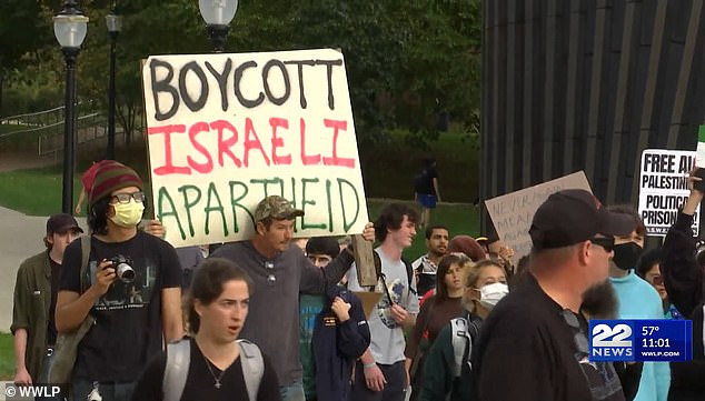 Pro-Palestinian students march on the campus of the University of Massachusetts