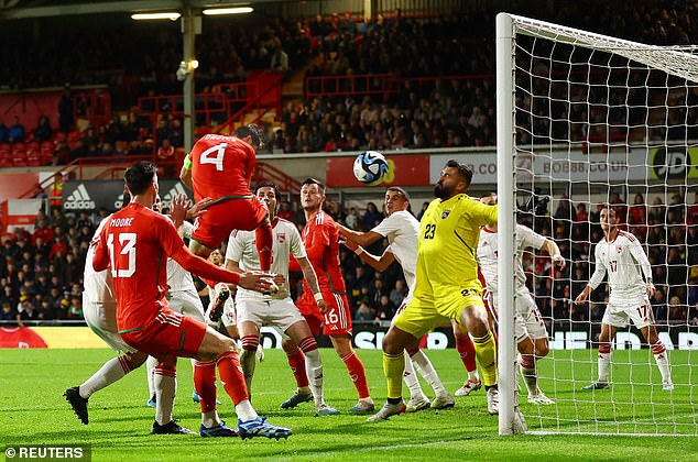 Ben Davies (No.4) captained the hosts and opened the scoring after 22 minutes at Wrexham