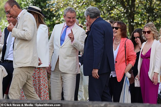 At his Downton Abbey co-star Michelle Dockery's wedding last weekend, Hugh Bonneville looked more polished, with the wedding ring he had worn for 25 years nowhere in sight - and neither was his faithful wife Lulu Williams.