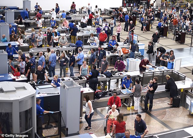 Buyers can now view the price history of certain flights via various booking platforms.  Pictured is a TSA checkpoint in Denver, Colorado