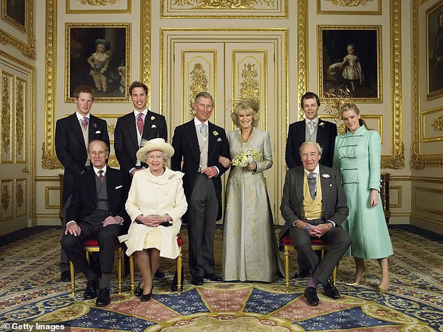 Prince Charles and Camilla surrounded by their family.  Back left: Prince Harry, Prince William and Camilla's children, Tom and Laura Parker Bowles.  From front left: The Duke of Edinburgh, the Queen and Camilla's father Bruce Shand