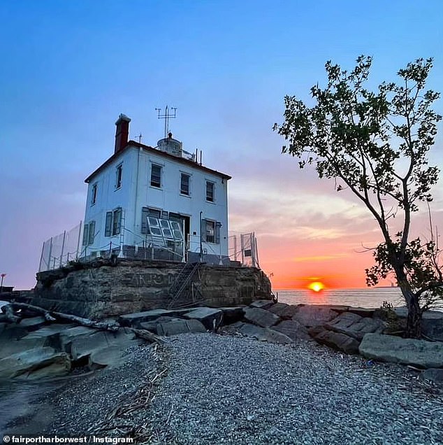 A woman who bought an old lighthouse in Ohio for $71,000 has shown off its incredible transformation into her dream summer home - which cost her $300,000 over ten years