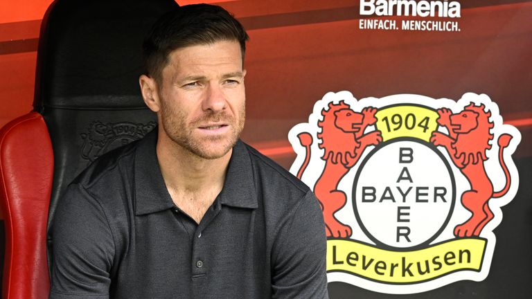 Leverkusen head coach Xabi Alonso watches a friendly soccer match between Bayer 04 Leverkusen and West Ham United in Leverkusen, Germany, Saturday, August 5, 2023. (Roberto Pfeil/dpa via AP)