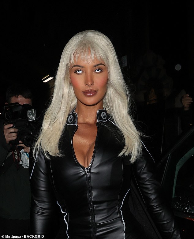 Bombshell: Maya has ditched her brunette locks for a platinum blonde wig, while also wearing white eye contacts, adding to the ghostly appeal of her look