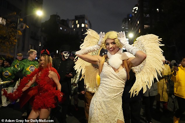 Large crowds took to the streets of Manhattan to celebrate the spooky holiday, including the resurrection of '60s star Marilyn Monroe