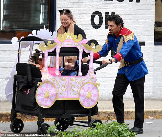 Singer Joe Jonas was also spotted earlier in the day in the Big Apple with children Willa and Delphine in a princess carriage stroller