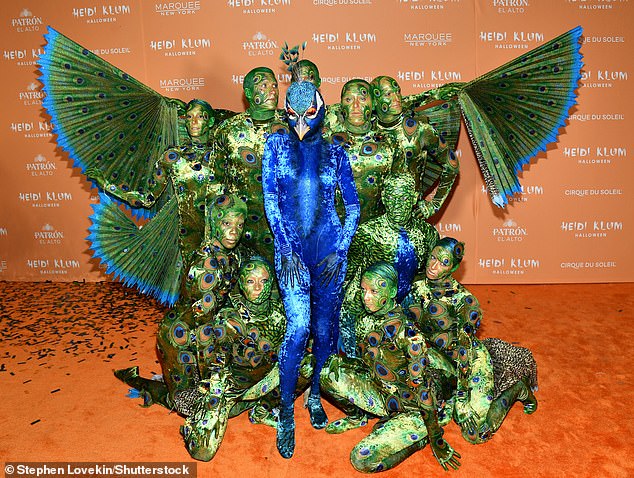 Peacock: When Klum wore her full peacock outfit, she was supported by another 10 people who essentially portrayed her plumage