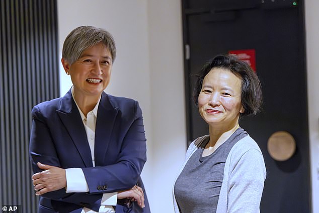 Australian journalist Cheng Lei (right) recently returned to Australia after spending three years behind bars in China.  She is pictured with Foreign Minister Penny Wong