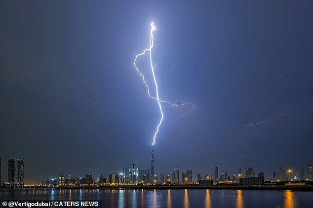 Dramatic footage shows lightning bolts striking the Burj Khalifa, the tallest building in the world