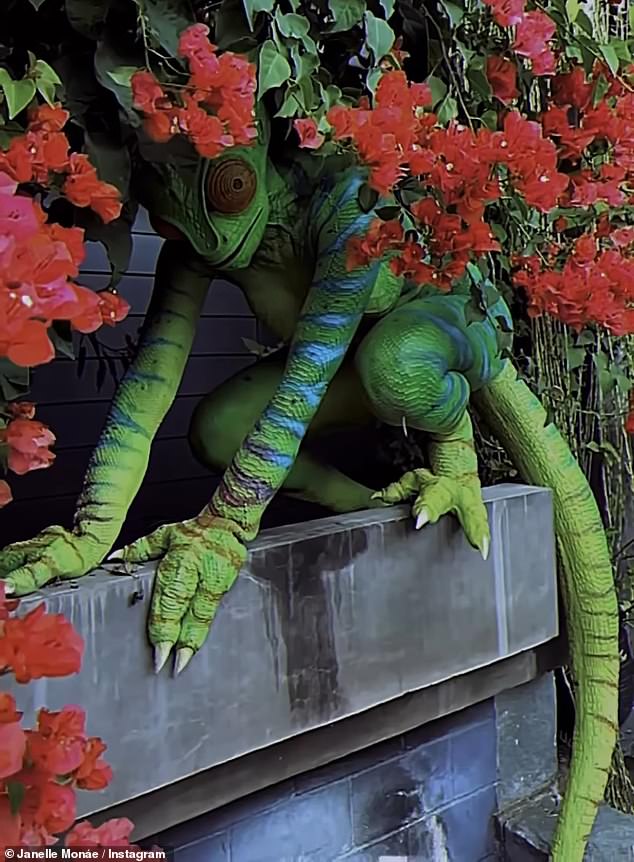 Cooking up a storm: She made a huge effort with her chameleon costume for the spooky holiday