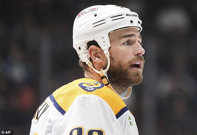 Bettman pointed out that the use of visors is mandatory league-wide, but six players are still required to go without visors after a grandfather clause was imposed in 2013 (above: Ryan O'Reilly)