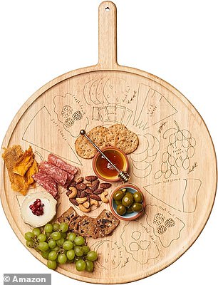 For those who spend most of their time in the kitchen, Oprah has added a range of products such as a $75 charcuterie board (seen) and a $214 knife set made by Cangshan Cutlery