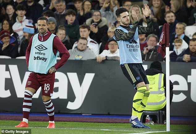 Rice (right) received a round of applause from the Hammers faithful as he warmed up
