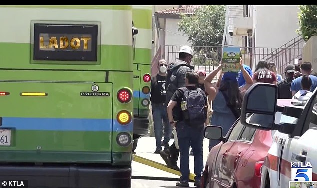 A bus carrying migrants from Texas arrives in Los Angeles, California, in July