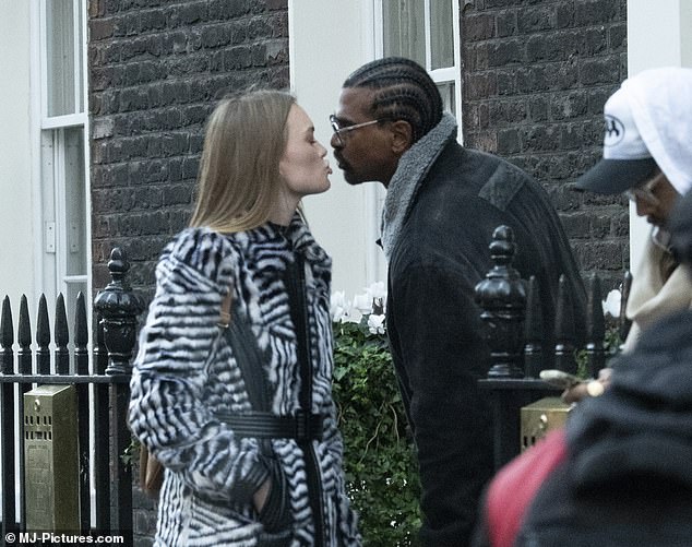 Hurry up!  The boxer couldn't keep his hands off the beautiful model as they walked arm in arm before stopping for a hug