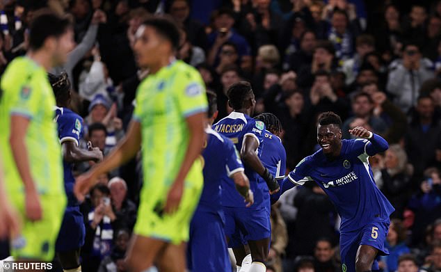 Chelsea players are celebrating after the deadlock was broken at Stamford Bridge on Wednesday