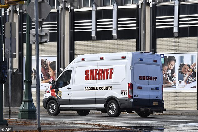 A Broome County sheriff's van leaves the U.S. District Court in Syracuse with Dai